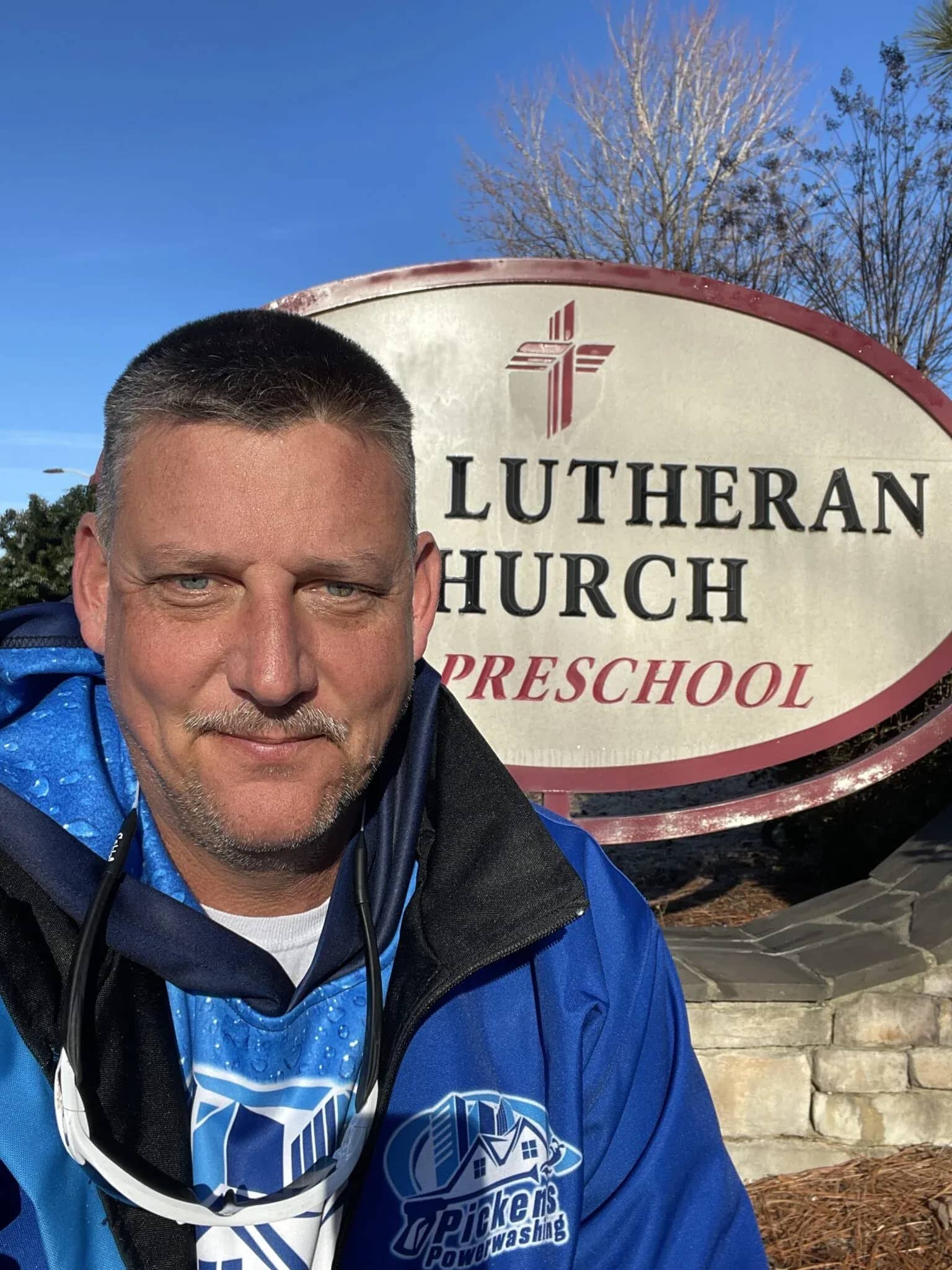 selfie of Keith Pickens, owner of Pickens Power Washing, outside of Hope Lutheran Church preschool