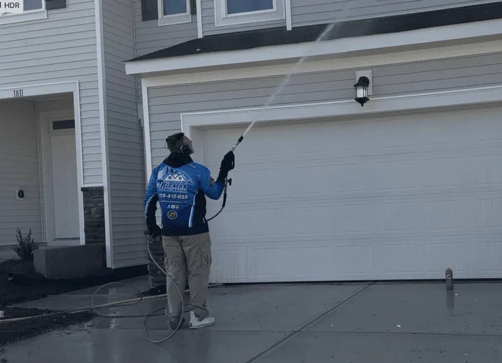 Top pressure washing company in Wake Forest NC soft washing a home