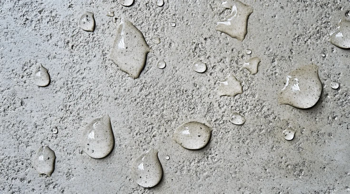 Water drops on sealed concrete, non-permeable concrete, waterproof concrete services in Raleigh and Wake Forest NC