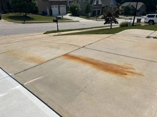 large rust stain on a Wake Forest driveway