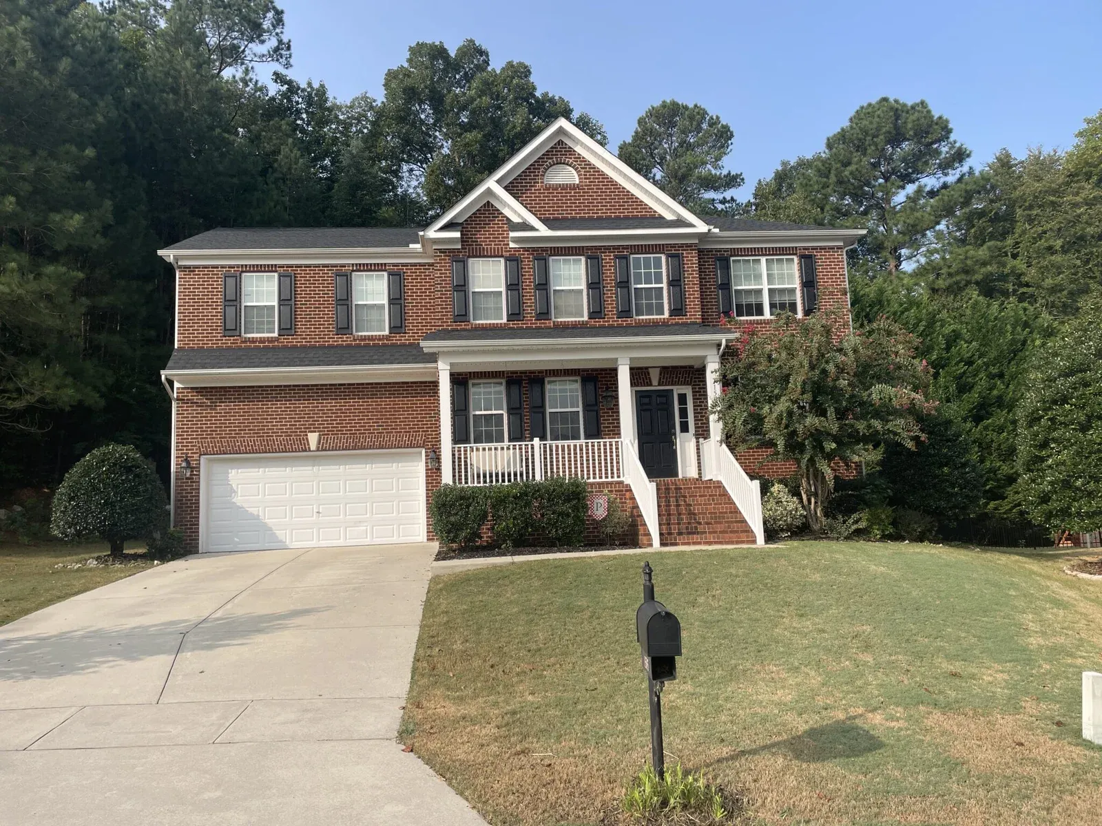 driveway after cleaned by power washing and dried, stains removed